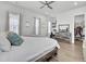 Spacious bedroom with natural light, hardwood floors, and a dedicated desk area at 69 Arrowwood Way, Summerville, SC 29485