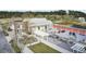 Charming Corner House cafe with outdoor seating, landscaping, and a welcoming pergola at 69 Arrowwood Way, Summerville, SC 29485