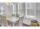 Bright dining room with natural light and hardwood floors at 69 Arrowwood Way, Summerville, SC 29485