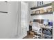 Cozy home office with a window, floating shelves, and a modern desk setup at 69 Arrowwood Way, Summerville, SC 29485