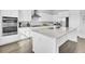 Well-appointed kitchen features stainless steel appliances, a central island, and ample cabinet space at 69 Arrowwood Way, Summerville, SC 29485