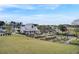 Attractive home in a walkable neighborhood with a lush lawn and colorful landscaping at 69 Arrowwood Way, Summerville, SC 29485