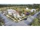 Inviting community corner with gazebo, plantings, and a red and white building at 69 Arrowwood Way, Summerville, SC 29485