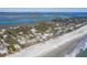 A beautiful beachfront homes with water access and marsh views are seen from above at 716 E Arctic Ave, Folly Beach, SC 29439