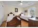 Bedroom featuring two twin beds, wood floors, neutral walls and closet at 716 E Arctic Ave, Folly Beach, SC 29439