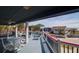 Inviting outdoor deck with plenty of room for entertaining, and relaxing seating at 716 E Arctic Ave, Folly Beach, SC 29439