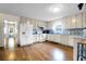 Traditional kitchen with ample cabinet space and hardwood style floors for a timeless appeal at 716 E Arctic Ave, Folly Beach, SC 29439