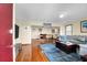 Bright living room features a comfortable seating area, hardwood floors, and stylish decor at 716 E Arctic Ave, Folly Beach, SC 29439