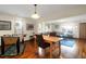 The dining table and foosball game are adjacent to the living room at 716 E Arctic Ave, Folly Beach, SC 29439