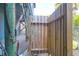 Outdoor shower featuring a wooden fence enclosure with nearby greenery at 716 E Arctic Ave, Folly Beach, SC 29439