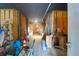 View of the home's undercarriage showing a cluttered storage area at 716 E Arctic Ave, Folly Beach, SC 29439