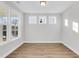 Bright, naturally lit room features hardwood floors and white trim at 718 Minton Rd, Charleston, SC 29412