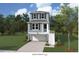 Charming three-story home with a ground-level garage and welcoming front porch at 724 Minton Rd, Charleston, SC 29412