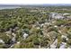 Aerial view overlooking a city with lush trees and foliage, and a beautiful coastline with a harbor at 750 Atlantic St, Mount Pleasant, SC 29464