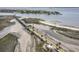 Scenic aerial view of a coastal bridge and walkway with lush greenery and the ocean in the background at 750 Atlantic St, Mount Pleasant, SC 29464