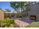 Private backyard with a brick patio, outdoor kitchen, and lush landscaping at 750 Atlantic St, Mount Pleasant, SC 29464
