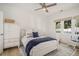 Light and airy bedroom with neutral decor, ceiling fan, and a crib at 750 Atlantic St, Mount Pleasant, SC 29464