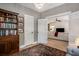 Stylish home office space connected to a living room with hardwood floors and ample natural light at 750 Atlantic St, Mount Pleasant, SC 29464