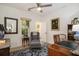 Charming office space features natural light and a cozy reading nook with a comfortable armchair at 750 Atlantic St, Mount Pleasant, SC 29464