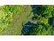 Aerial view of the property, featuring marsh and a private dock surrounded by trees and natural beauty at 750 Lakenheath Dr, Mount Pleasant, SC 29464