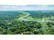 Stunning aerial view of lush landscape with waterways and distant cityscape, perfect for nature lovers at 750 Lakenheath Dr, Mount Pleasant, SC 29464