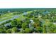 Overhead view of a wooded neighborhood with nearby boats on a river or bay, ideal for waterfront living at 750 Lakenheath Dr, Mount Pleasant, SC 29464