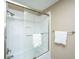 Modern bathroom with white subway tile shower, glass door, and towel racks for convenience at 750 Lakenheath Dr, Mount Pleasant, SC 29464
