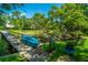 Scenic dock featuring a kayak, lush greenery, and tranquil waters at 750 Lakenheath Dr, Mount Pleasant, SC 29464