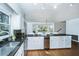 Kitchen with granite countertops, stainless appliances, white cabinetry, and a double sink under a window at 750 Lakenheath Dr, Mount Pleasant, SC 29464