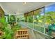 Screened-in porch featuring comfortable seating and outdoor views at 750 Lakenheath Dr, Mount Pleasant, SC 29464