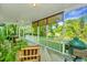 Well-appointed porch with comfortable furniture and scenic views at 750 Lakenheath Dr, Mount Pleasant, SC 29464