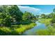 Breathtaking water view showcases marshland, vibrant greenery, and peaceful waterfront living at 750 Lakenheath Dr, Mount Pleasant, SC 29464