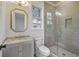 Stylish bathroom features a glass enclosed shower, decorative tile, and a marble vanity at 755 Adluh St, Mount Pleasant, SC 29464