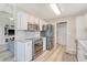 Modern kitchen featuring stainless steel appliances, light countertops and ample cabinet space at 8405 Wylie Dr, North Charleston, SC 29406