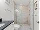 Modern bathroom with glass walk-in shower and neutral color palette at 9000 Palmetto Dr # G203, Isle of Palms, SC 29451
