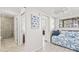 Inviting bedroom with comfortable daybed, stylish decor, and access to the bathroom at 9000 Palmetto Dr # G203, Isle of Palms, SC 29451