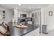 Updated kitchen featuring stainless steel appliances, a breakfast bar, and stylish finishes for a contemporary feel at 9000 Palmetto Dr # G203, Isle of Palms, SC 29451
