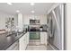 Modern kitchen with stainless steel appliances, sleek countertops, and ample storage space for cooking enthusiasts at 9000 Palmetto Dr # G203, Isle of Palms, SC 29451