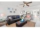 Bright and airy living room open to the kitchen, featuring comfortable seating and decor at 9000 Palmetto Dr # G203, Isle of Palms, SC 29451
