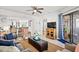 Cozy living room with comfortable seating, a ceiling fan, and access to a balcony, creating a relaxing atmosphere at 9000 Palmetto Dr # G203, Isle of Palms, SC 29451