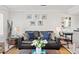 Stylish living room with a comfortable sofa, nautical decor, and plenty of seating space at 9000 Palmetto Dr # G203, Isle of Palms, SC 29451