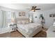 Serene bedroom features a king-sized bed, soft lighting, and calming decor, creating a relaxing retreat at 9116 Fieldstone Trace, Summerville, SC 29485