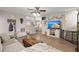 Cozy living room with hardwood floors, comfortable seating, and a convenient pass-through to the kitchen at 9116 Fieldstone Trace, Summerville, SC 29485