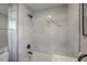 Contemporary bathroom showcasing a tub with marble-style tile surround at 10 Humphrey Ct, Charleston, SC 29403