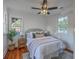 Bright, airy bedroom with hardwood floors and natural light from two large windows at 10 Humphrey Ct, Charleston, SC 29403
