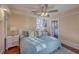 Comfortable bedroom featuring a large bed with blue accents and ample natural light at 10 Humphrey Ct, Charleston, SC 29403
