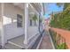 Charming home exterior with white siding, balcony, and landscaped walkway, providing a picturesque curb appeal at 10 Humphrey Ct, Charleston, SC 29403