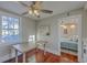 Bright, airy kitchen featuring a wooden table and view into a bedroom at 10 Humphrey Ct, Charleston, SC 29403