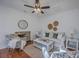 Bright living room featuring hardwood floors, a decorative fireplace, and comfortable seating at 10 Humphrey Ct, Charleston, SC 29403