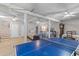 Large basement featuring a ping pong table, a bed, seating and a staircase at 1008 Hoodtown Rd, Bonneau, SC 29431